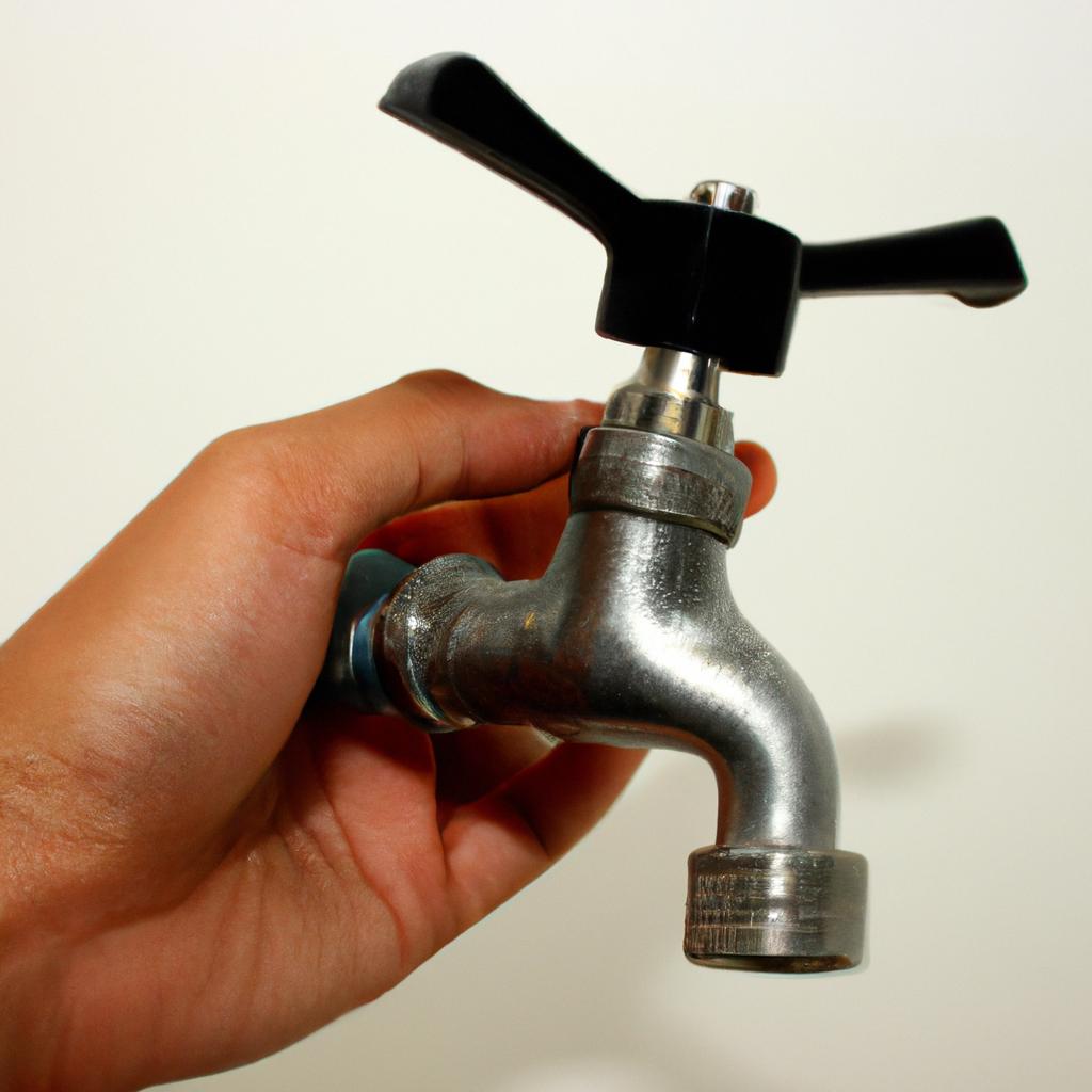 Person holding a water-efficient faucet
